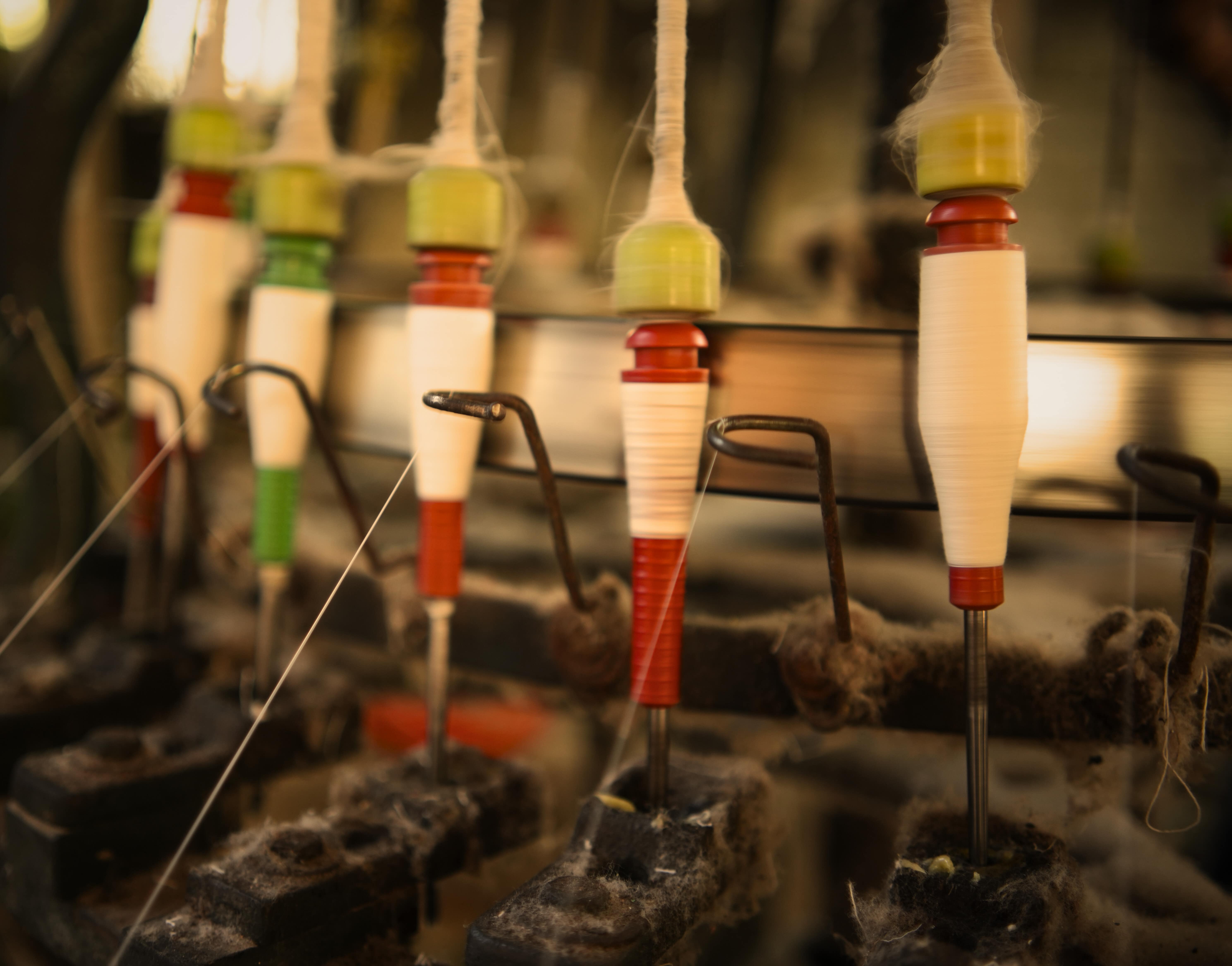 Charkha spinning wheel with thread spools